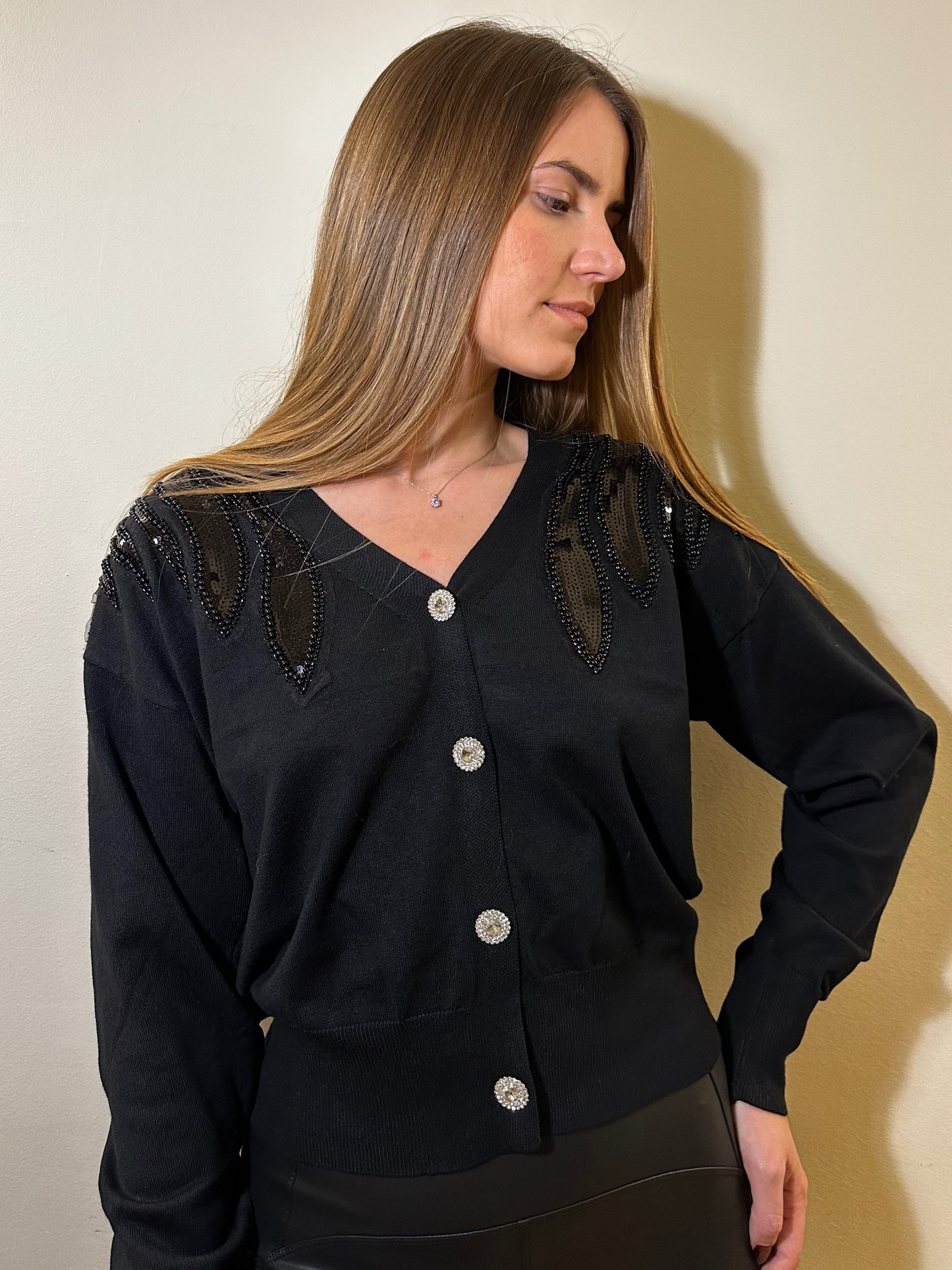 Cardigan with crystal buttons and black sequined shoulders